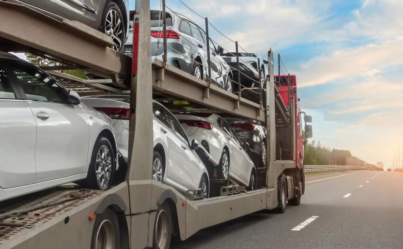 SGT Auto Transport open haul on highway